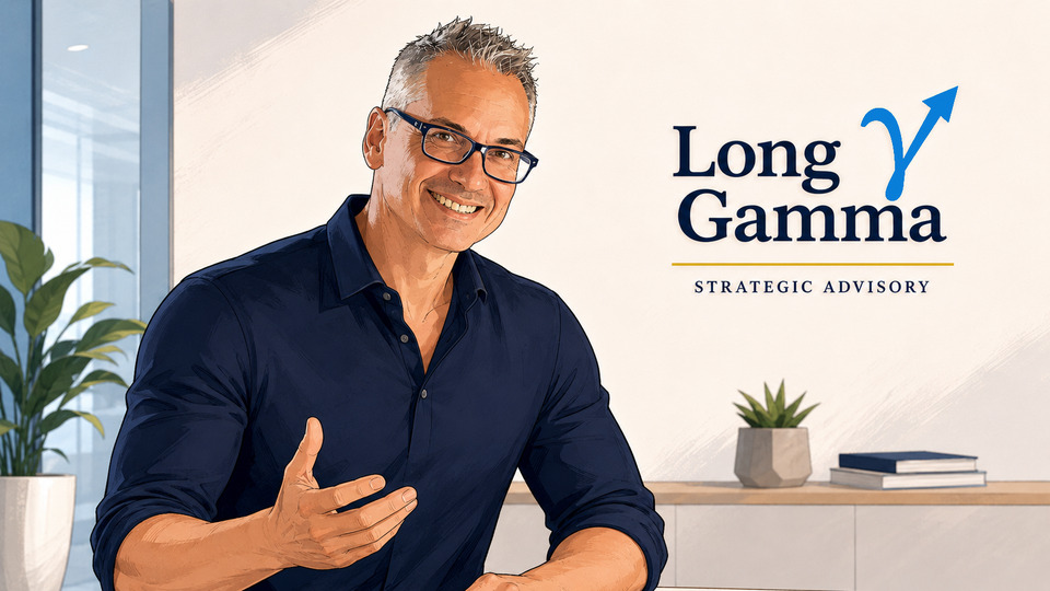 Enrique Opi, Principal of Long Gamma, at his desk with the Long Gamma wordmark behind him